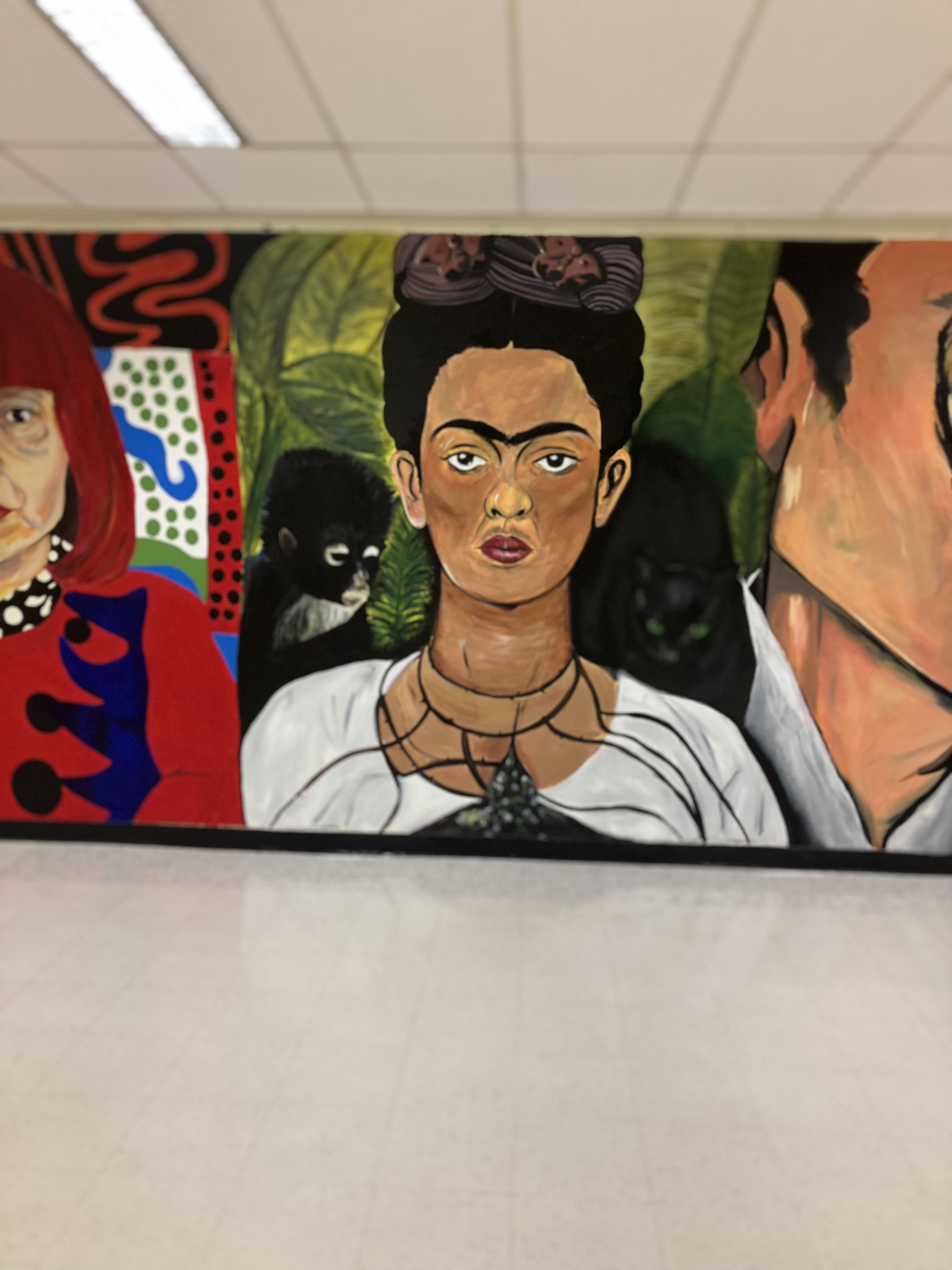Frida Kahlo as painted on the Wall of Artists mural at Western High School